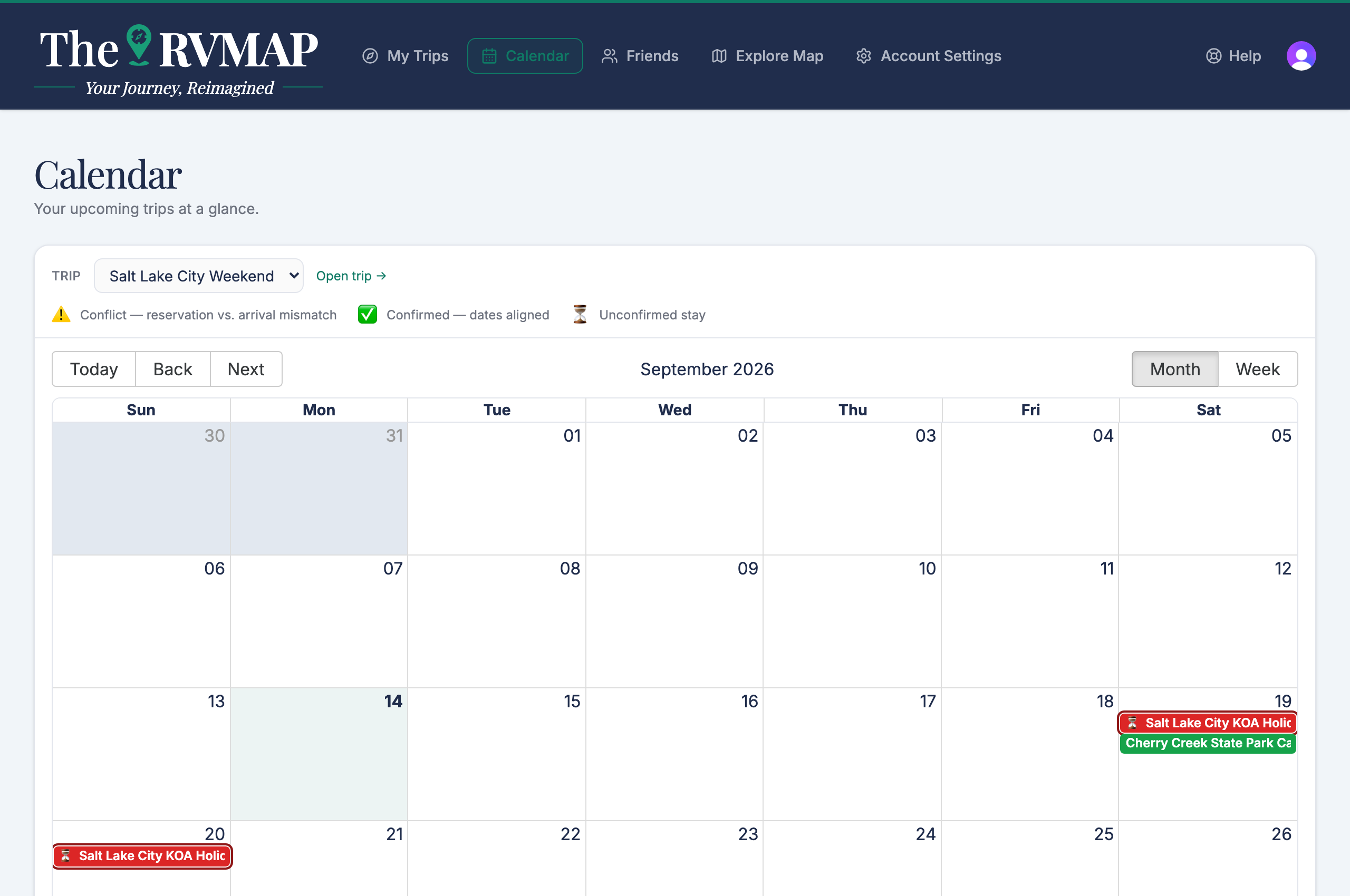 Calendar month view with the status legend, all trips shown (web)